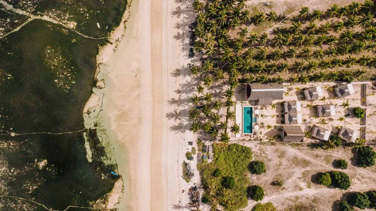 The beach and reef directly below the property