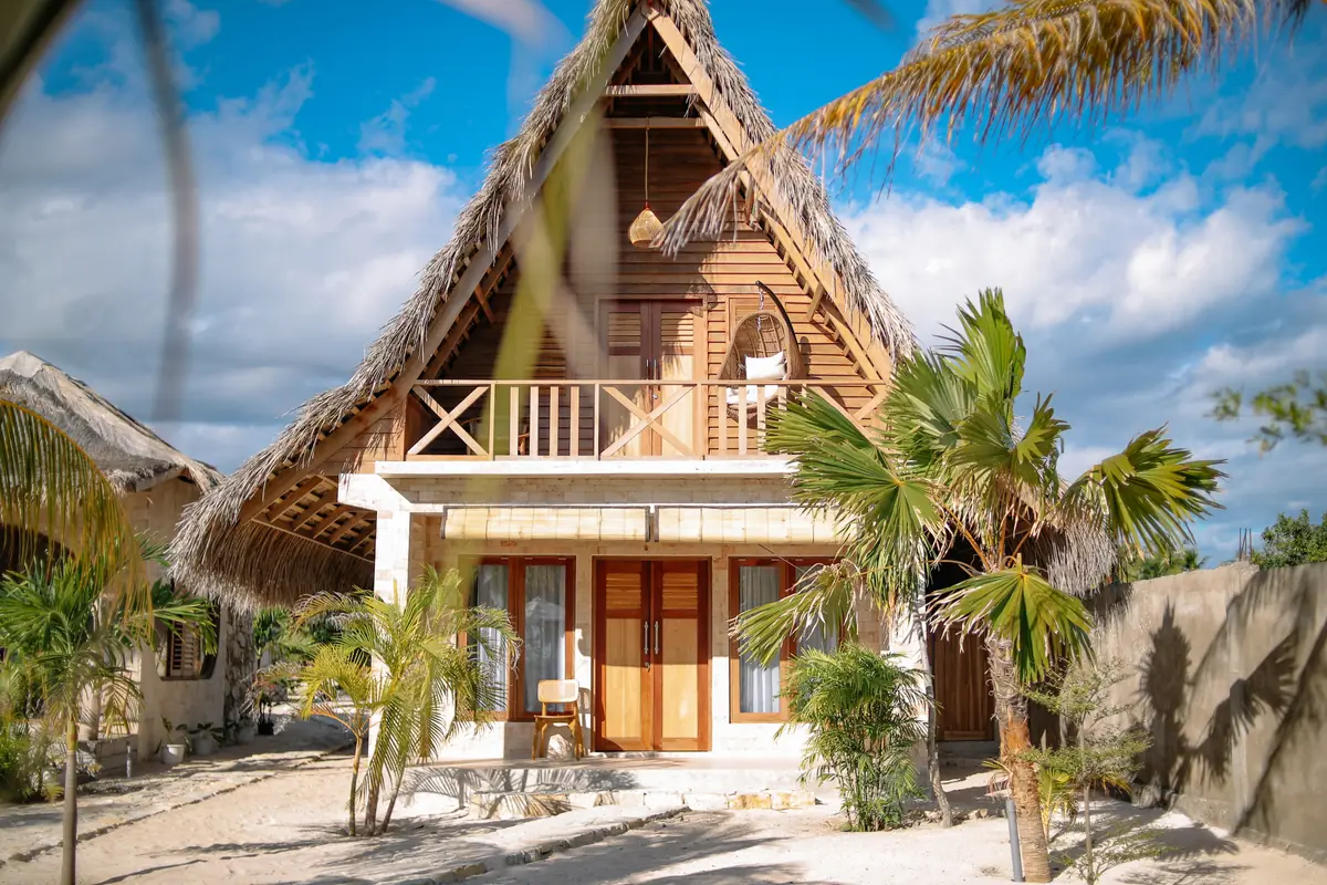 The two-storey thatched A-frame Family Room facing the pool