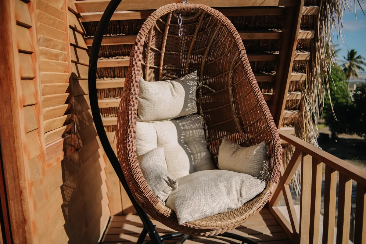 Rattan hanging chair on the Family Room balcony