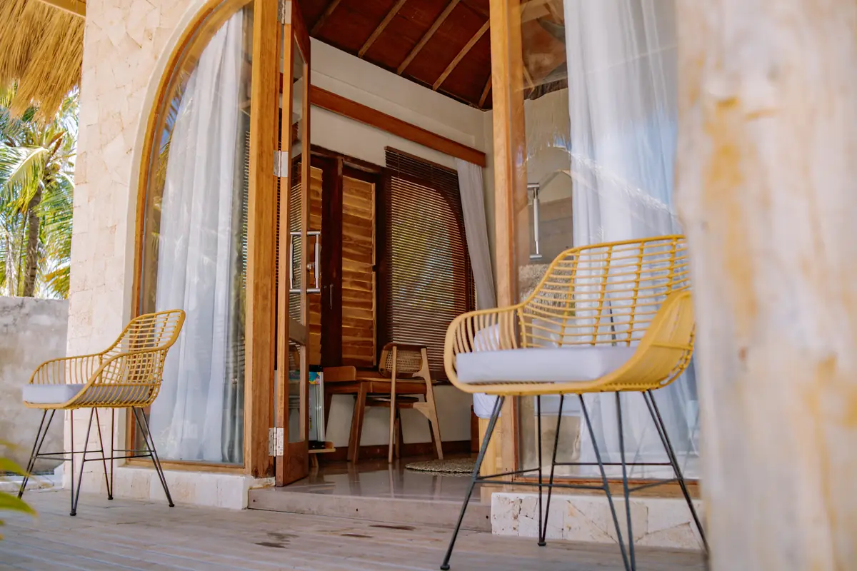 Two rattan chairs on the Garden Bungalow terrace