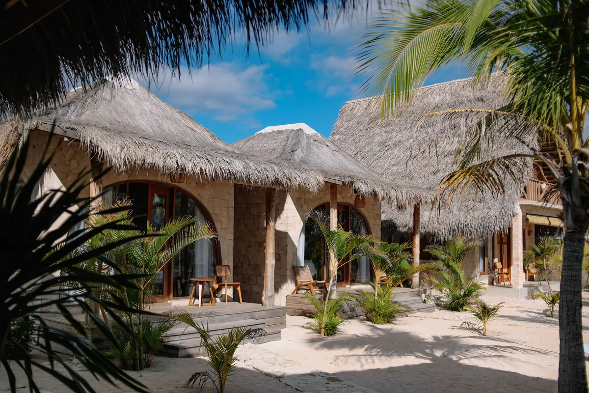 Sand path between the thatched rooms