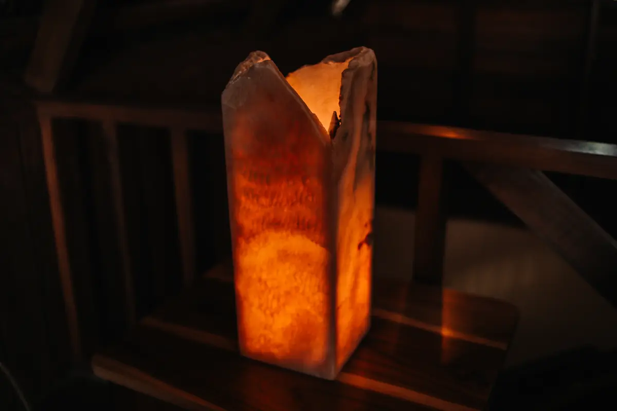 A stone lamp glowing in the Family Room