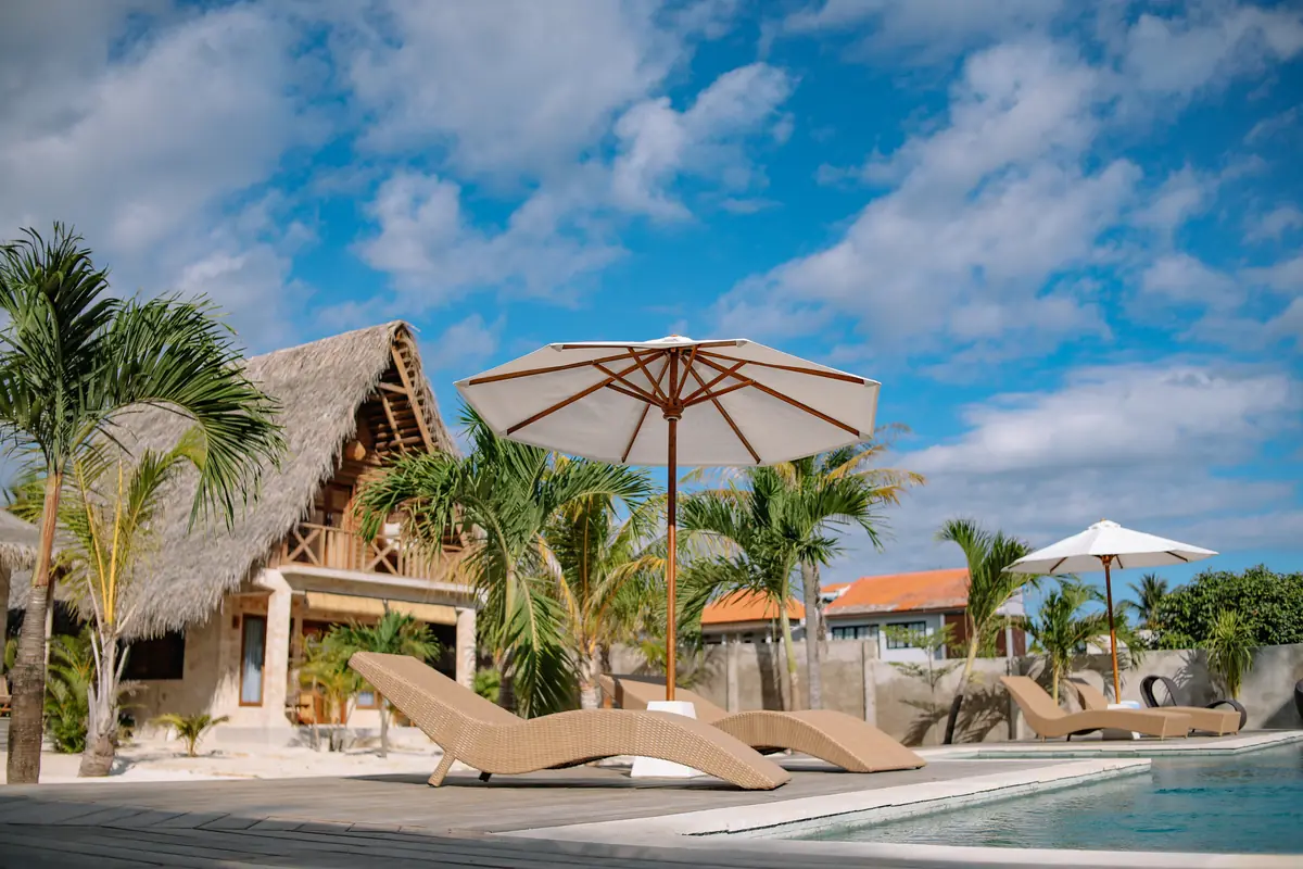 Umbrella and loungers by the pool